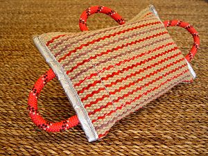 Dog bite pad made of jute with 3 handles