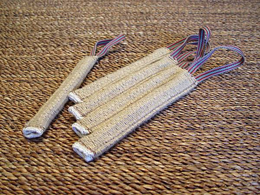 Pocket toy made of jute with handle